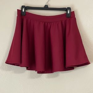 Sugarpuss, size large. Burgundy skirt.  On the shorter side.